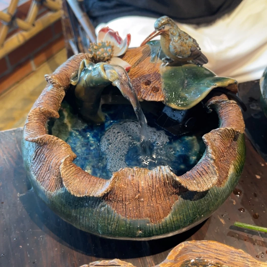 V***g陶艺作品翠鸟流水