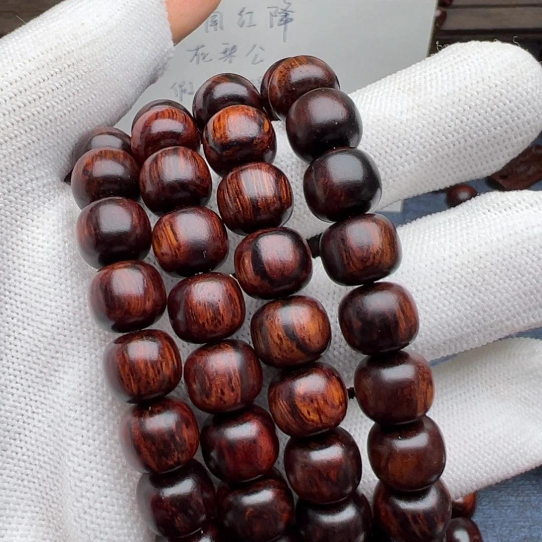 木海南红降花梨公1.0黑金满妖孽纹带留疤超一档