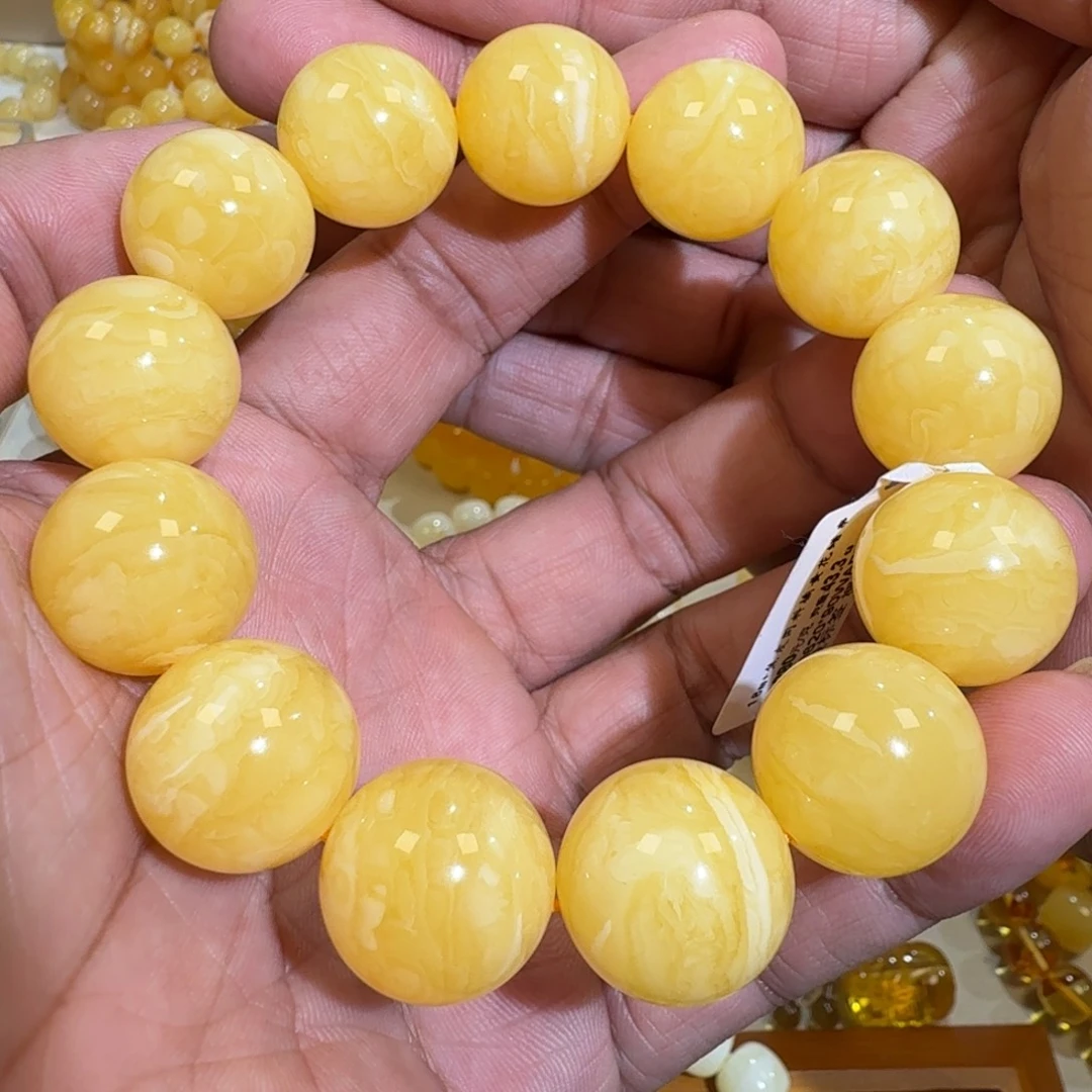 琥珀未镶嵌珠宝奇石18m焦皮同料橘黄花蜡串43.3克