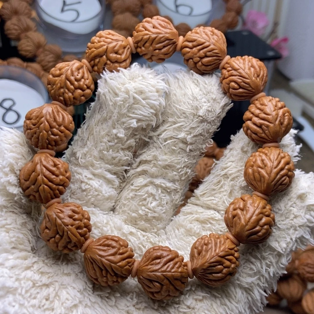 手串桃核闪电购 52