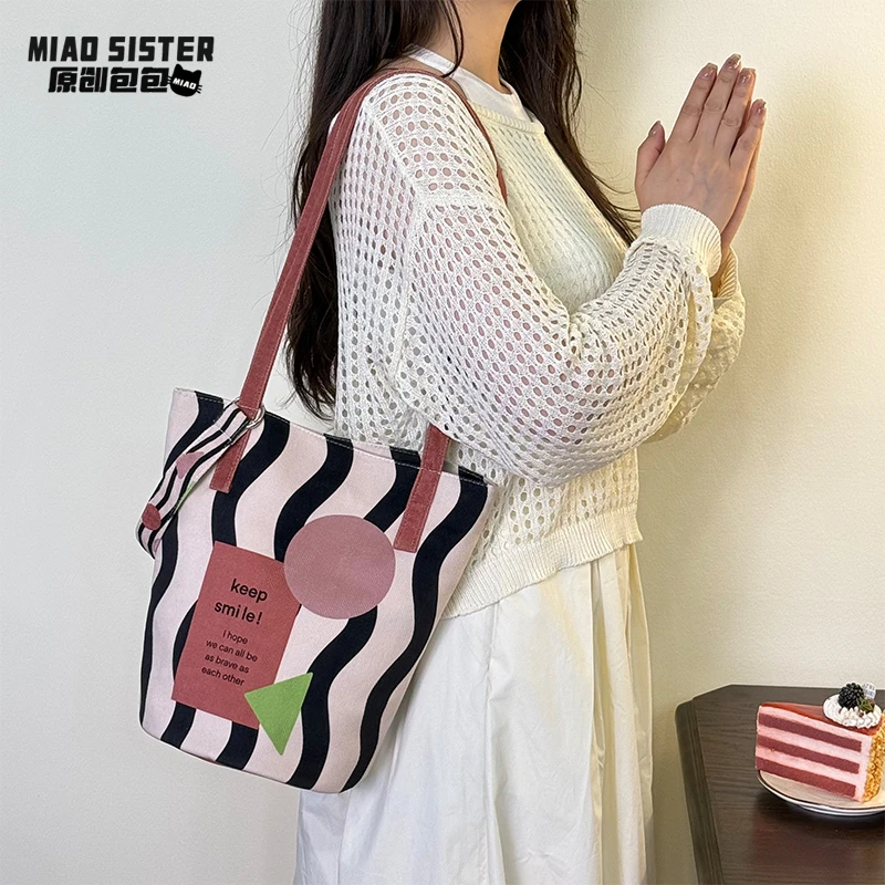MIAO莫兰迪几何春夏新款文艺复古帆布大容量通勤水桶包