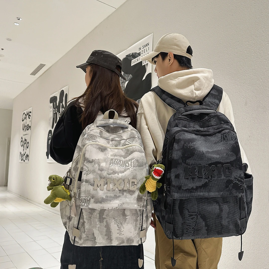 高颜值书包男生初中生高中生超大容量百搭双肩包出差旅游背包女