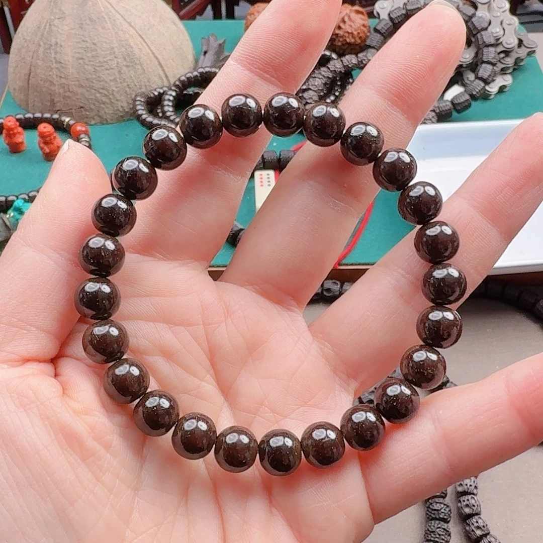 钱***橙手串椰蒂9圆珠手串