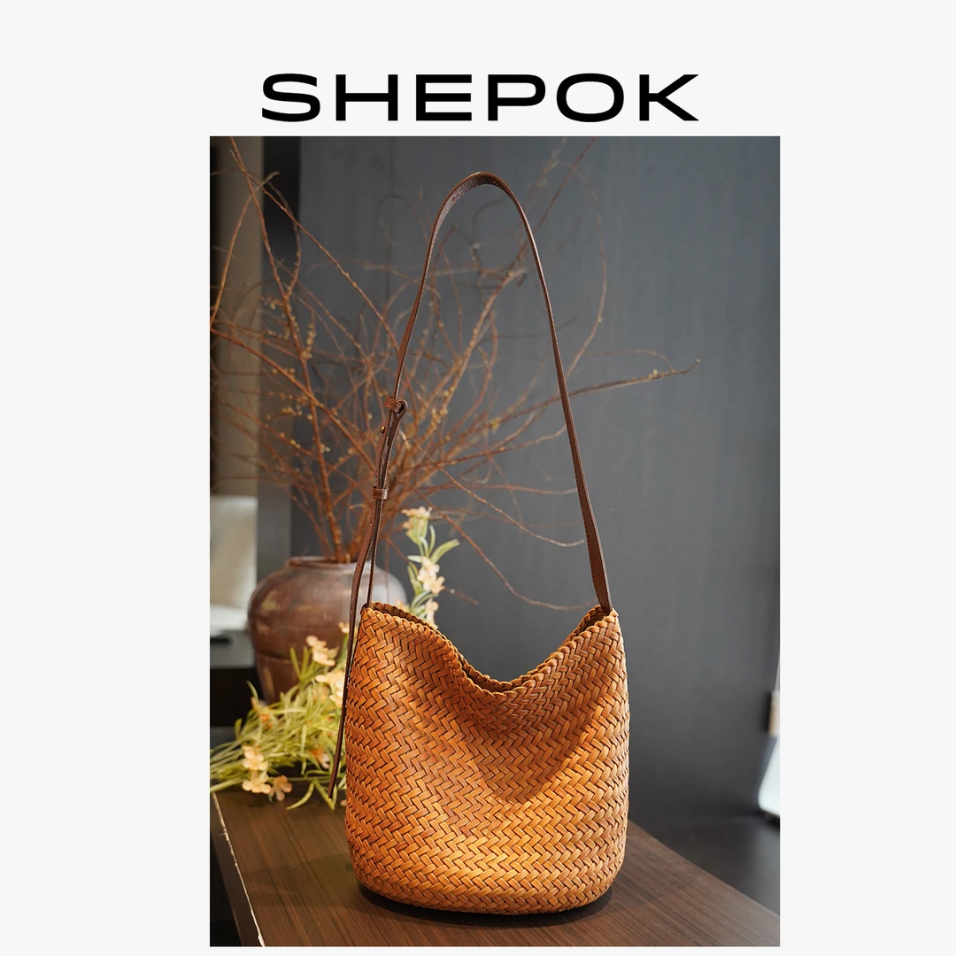 西泊克2025新款头层植鞣牛皮手工编织包女大容量托特单肩水桶包包