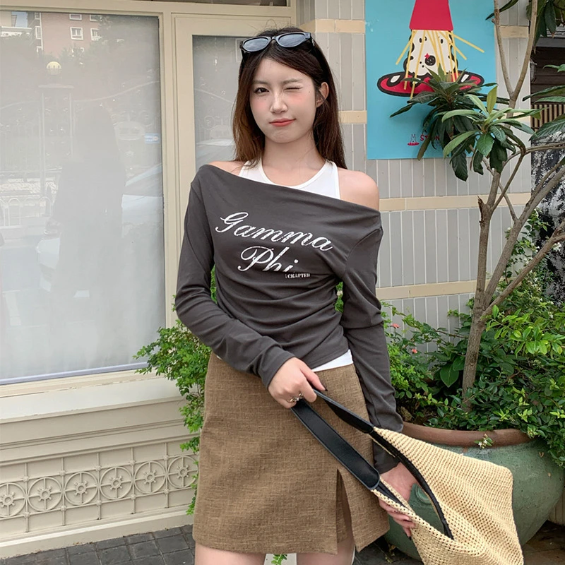 灰色假两件一字肩上衣女2025早秋新款独特别致露肩长袖T恤