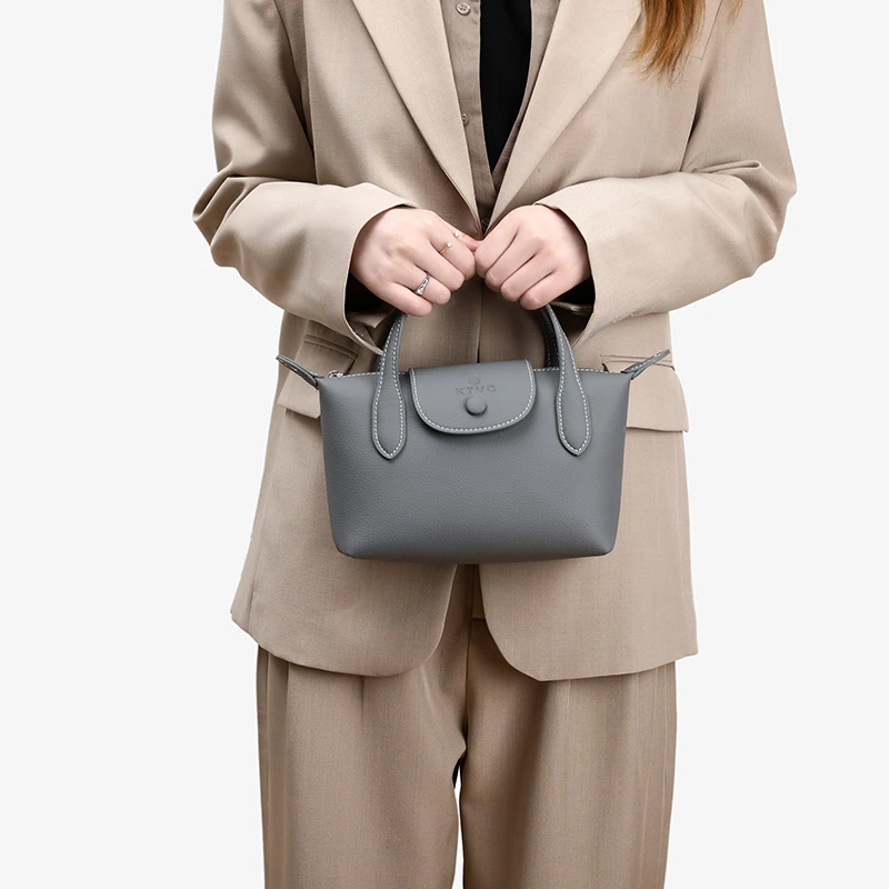 拉链单根手拎包手提式水桶包小众纯色单肩轻奢单肩牛皮小众饺子包