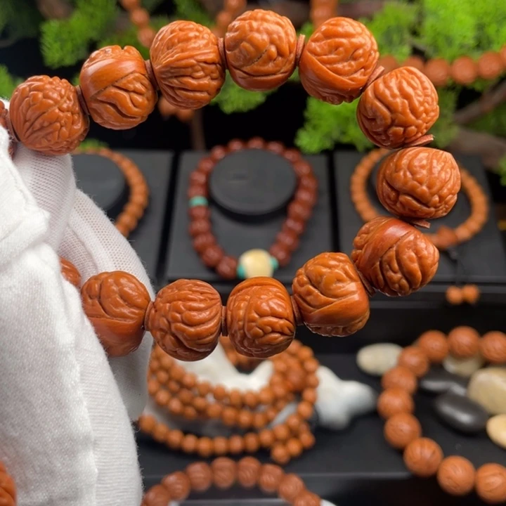 ****王吊坠桃核精品单圈