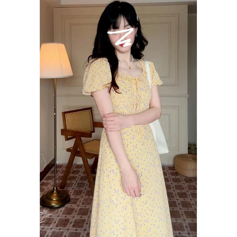 法式黄色短袖碎花连衣裙子女夏2025年新款小个子收腰显瘦气质长裙