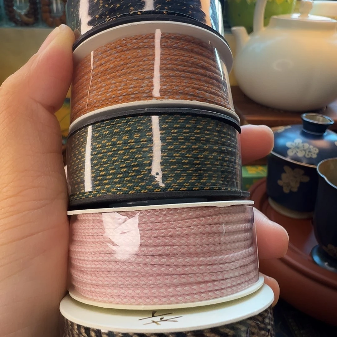 柏香籽/百香籽吊坠多彩包心棉绳发一卷