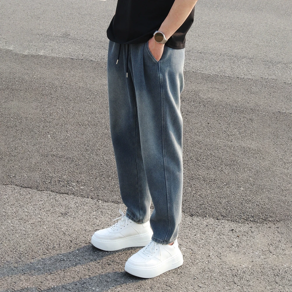 水洗黑牛仔卫裤版牛仔裤人字纹男款美式裤子秋冬加厚微锥直筒长裤