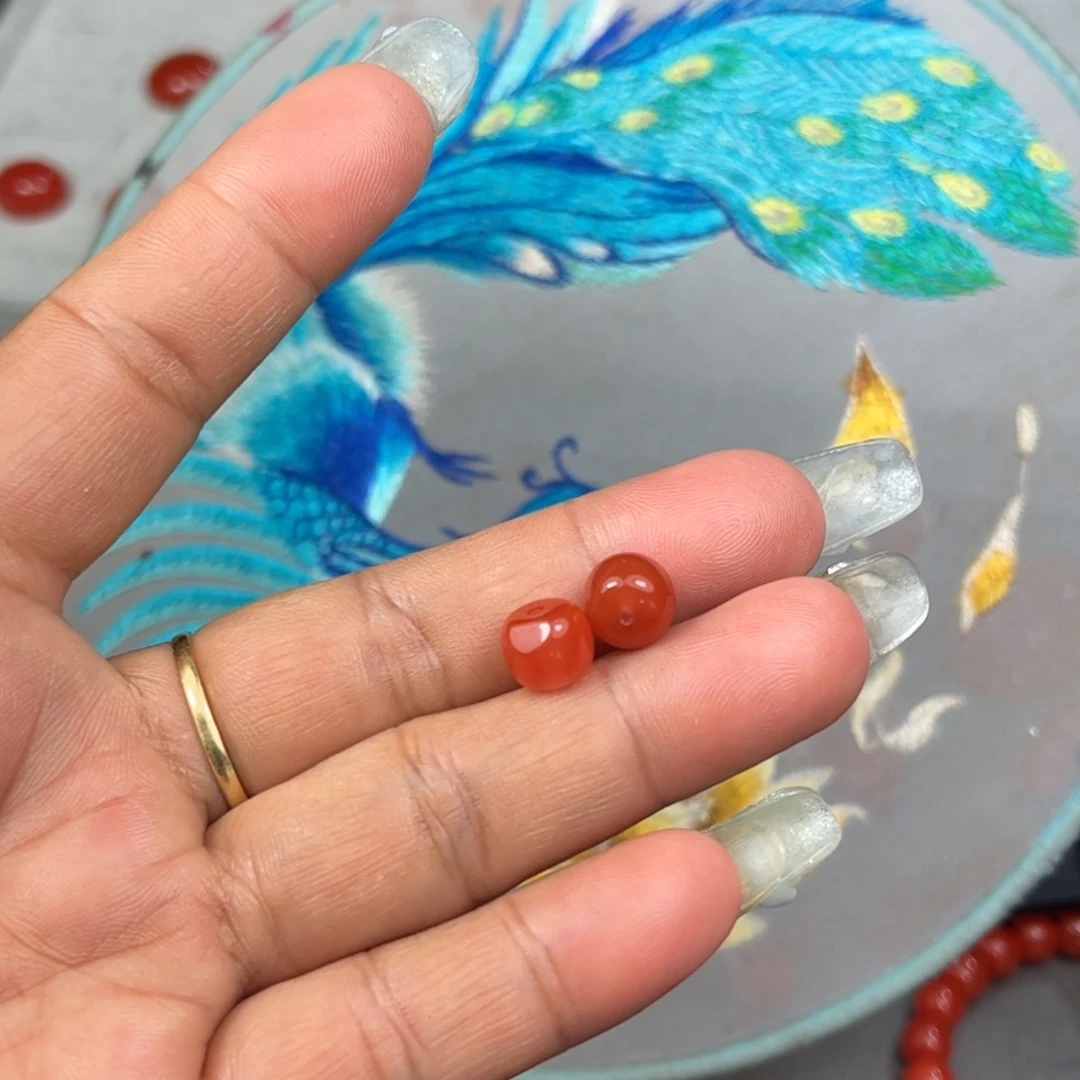 哈***乐未镶嵌珠子二个南红玛瑙