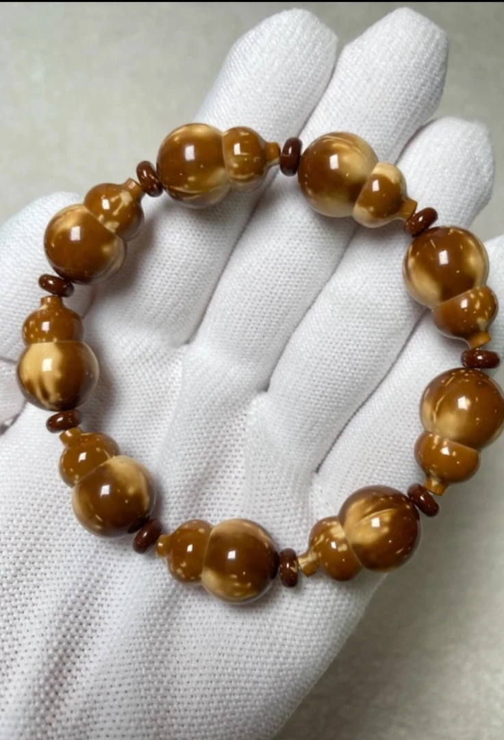 1.2*1.9无鼠眼精工焦糖色紫金鼠葫芦文玩手链