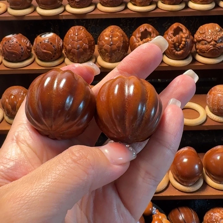 诚****巴西橄榄核雕工艺品