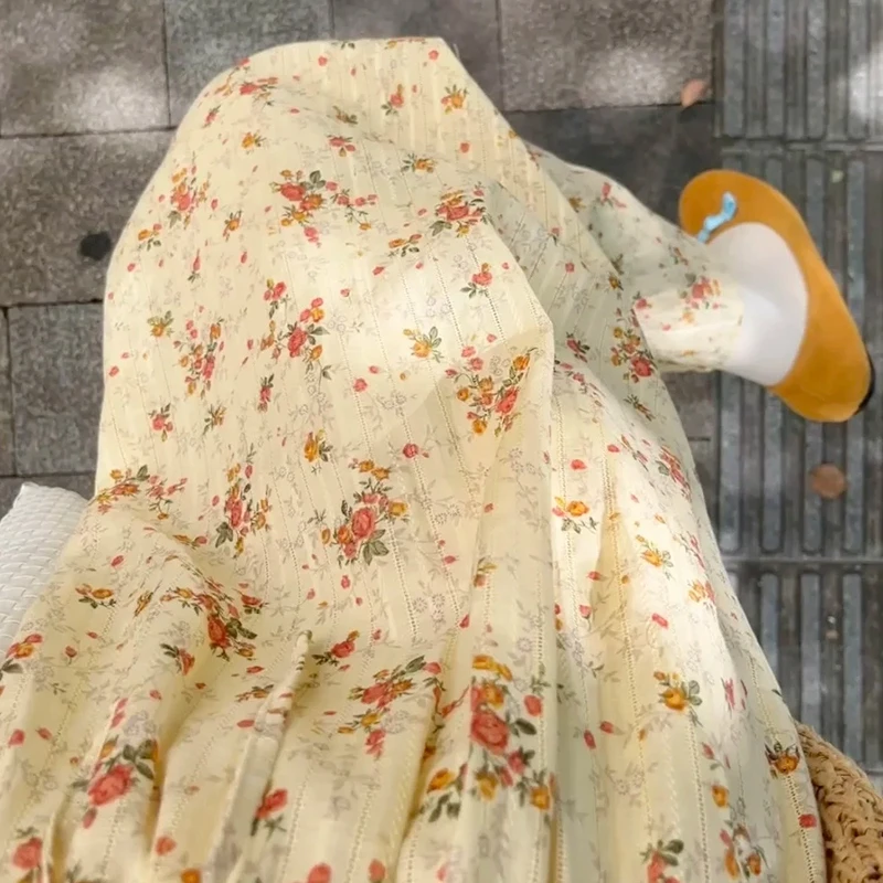 4345温柔风黄色碎花吊带连衣裙子女夏季2025新款收腰显瘦度假长裙