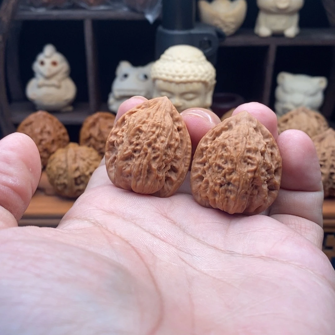 尾***.文玩核桃把件29+野生鸡心