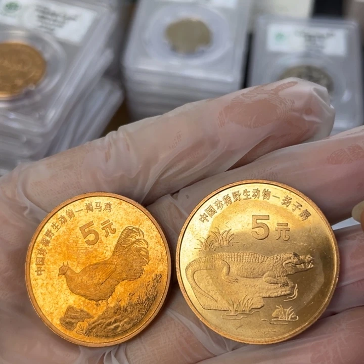 其他普通金属微氧化的动物币一对