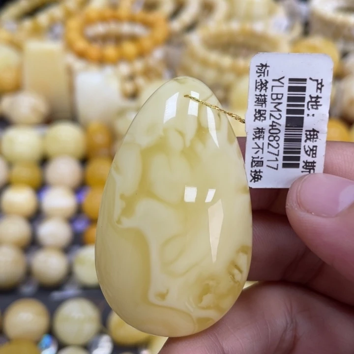 蜜蜡未镶嵌裸石48*29*12mm花粉妖花