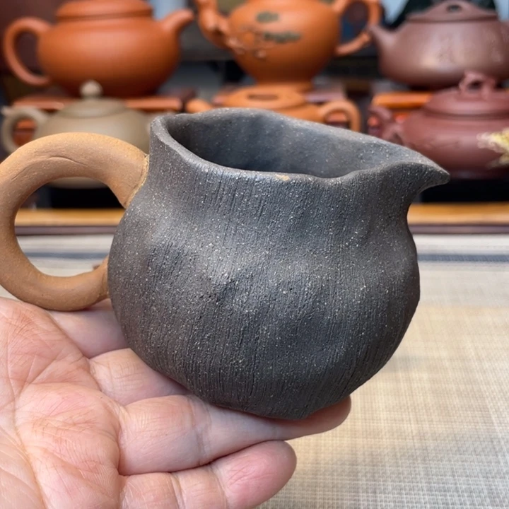 紫砂茶杯微微瑕公道杯