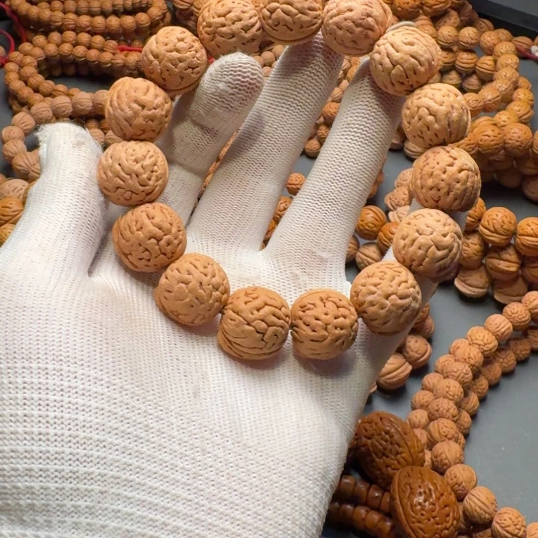 一***荪桃核手串盘锦磐石爆肉纹手串白茬