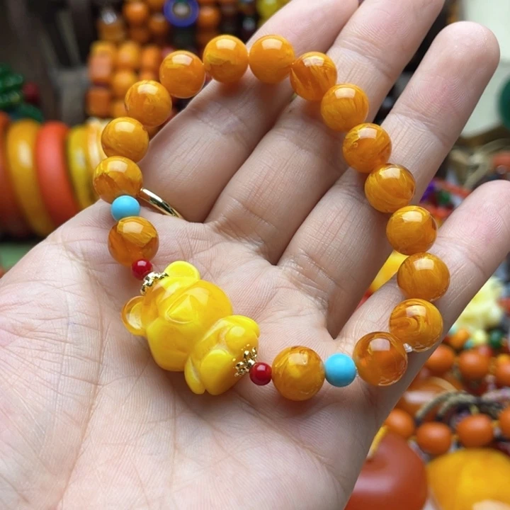 树脂制品悦***游57号小熊手串