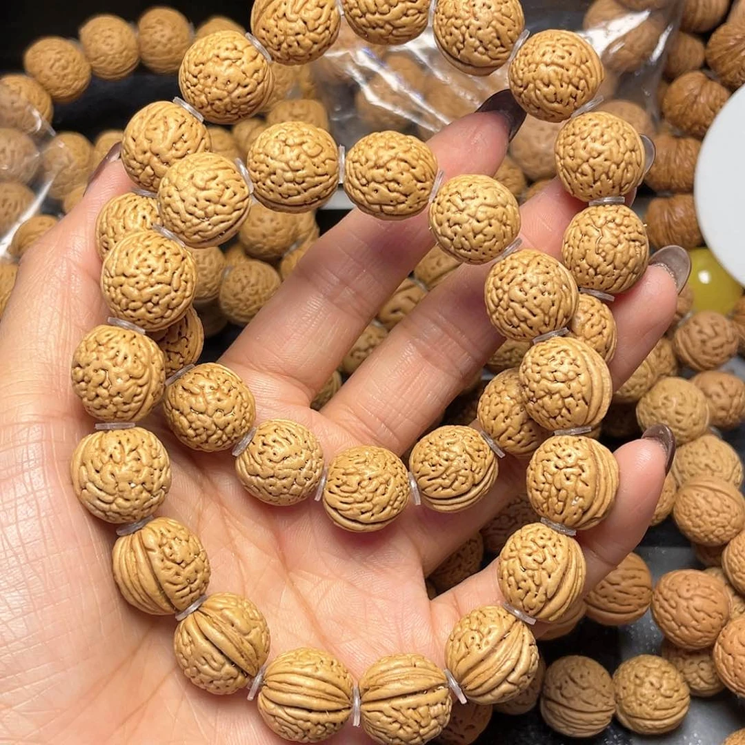 桃核手串垣****部15野生钱袋子手串