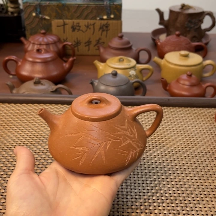 紫砂茶壶子冶满刻黄降坡半手壶