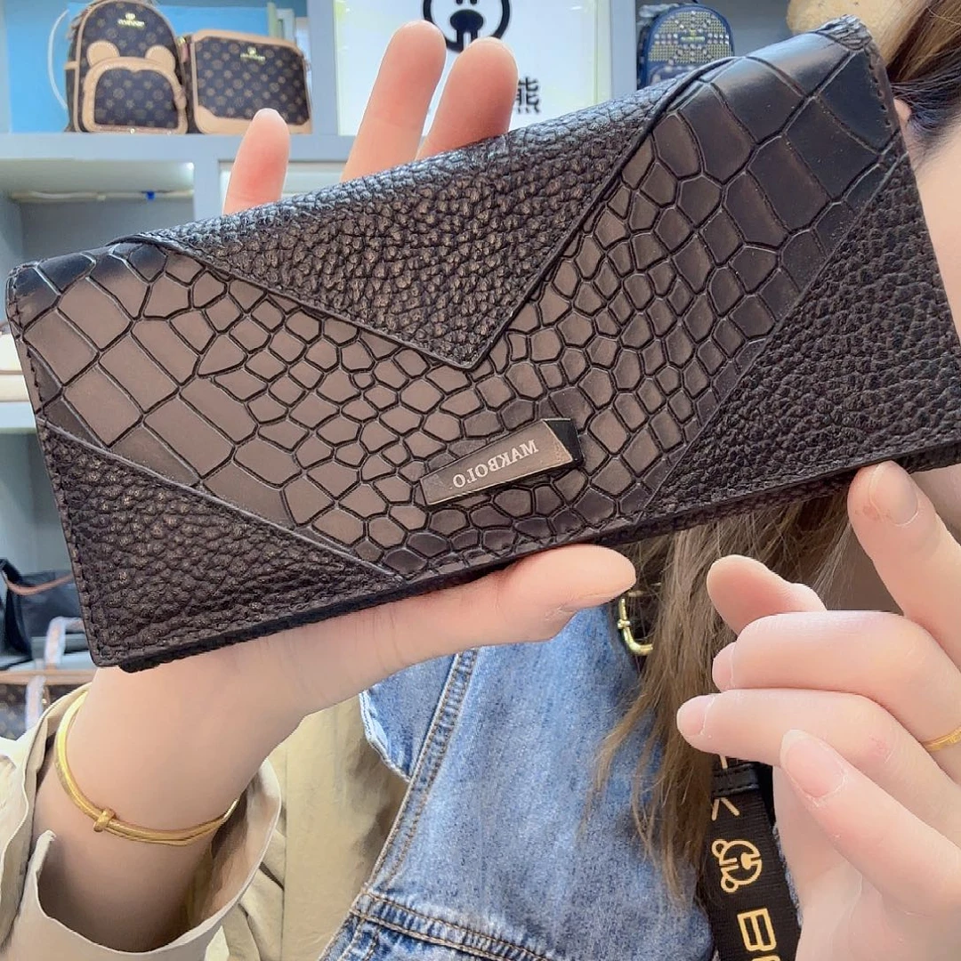 PVC5481黑色牛皮三斜钱包