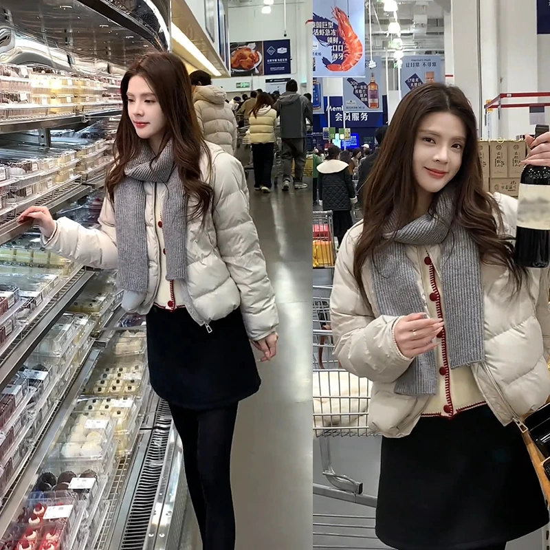 冬季温柔系穿搭女2025新款韩版时尚毛衣半身裙保暖棉服外套三件套