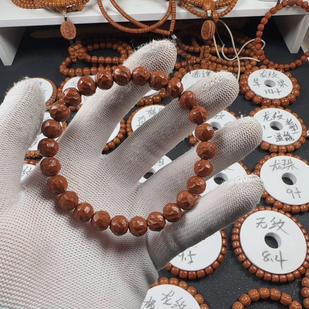 .***.桃核手串9*8龙纹无相