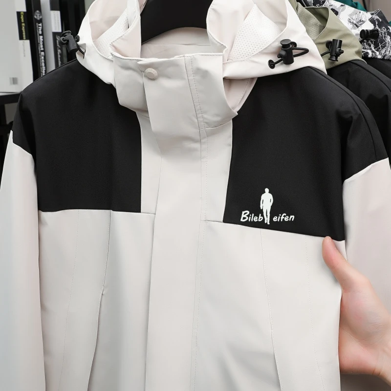 奥特莱斯户外冲锋衣男女同款防风防水情侣秋冬登山服外套刺绣外套