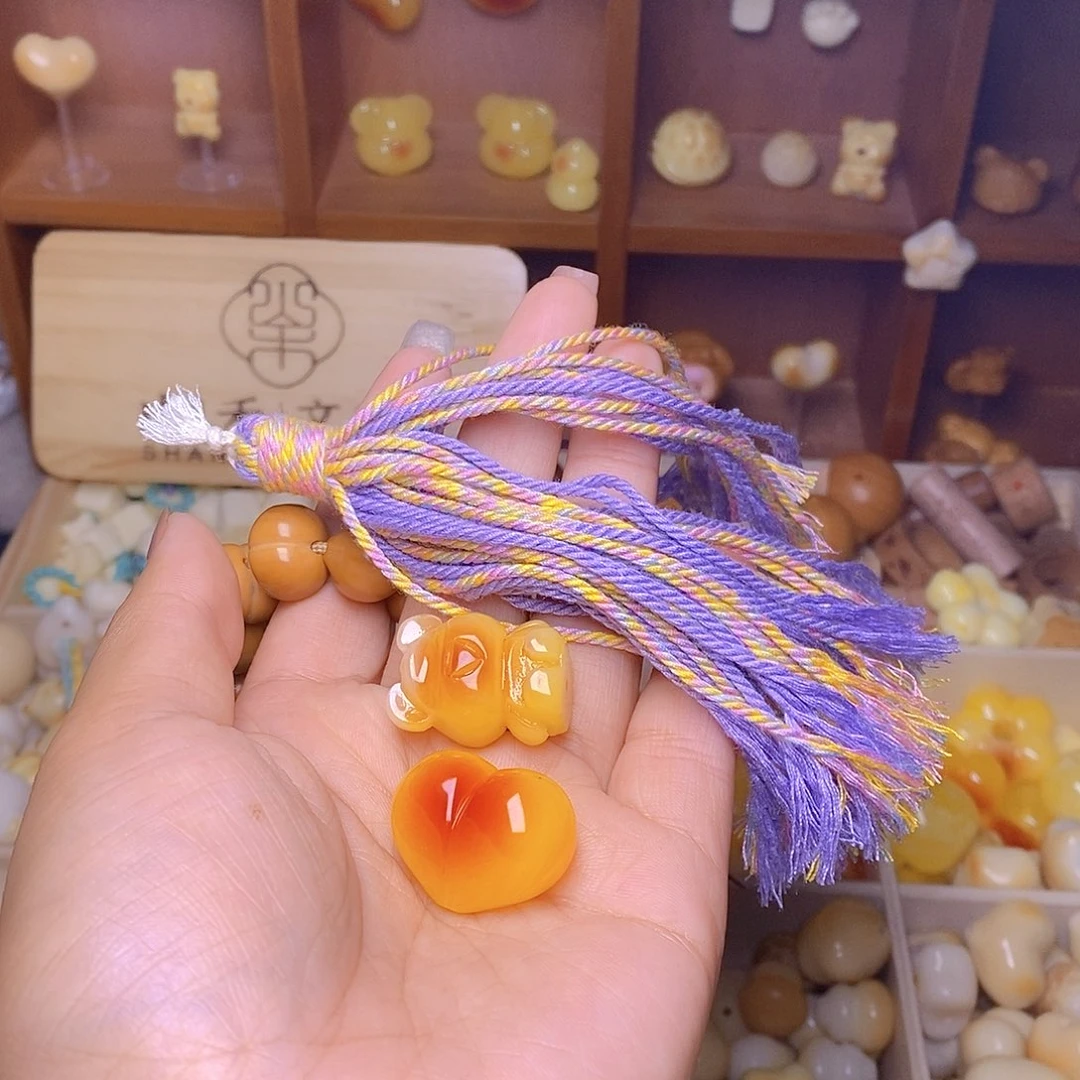 东***梅猴头核桃吊坠爱心小熊紫流苏