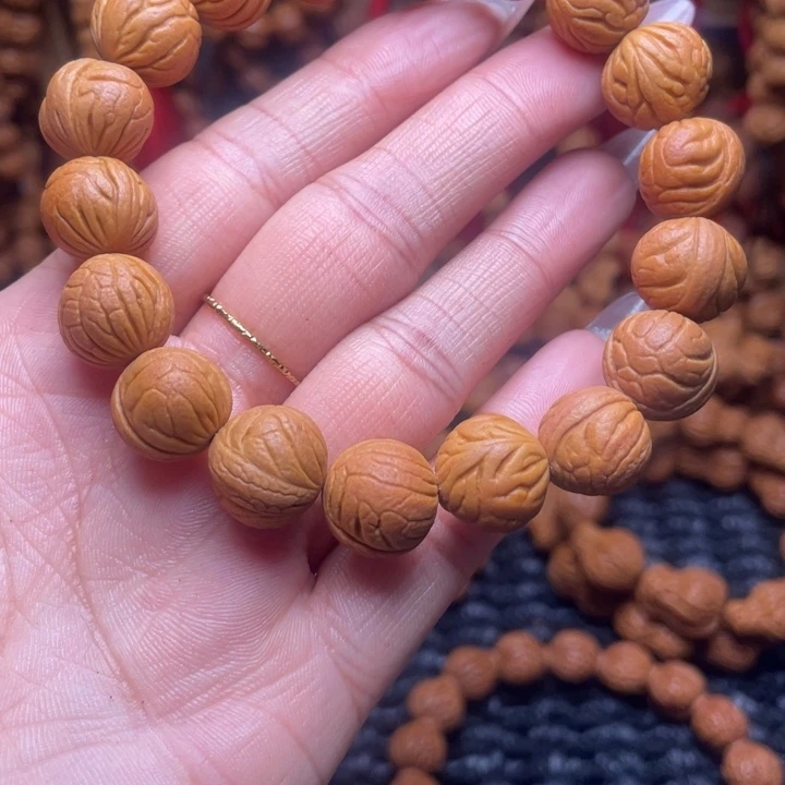 木质类龙纹桃枭手串