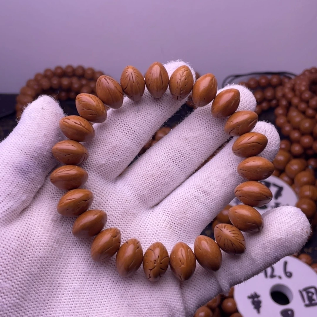 【闪购商品】吊坠桃核14龙纹桃核飞蝶