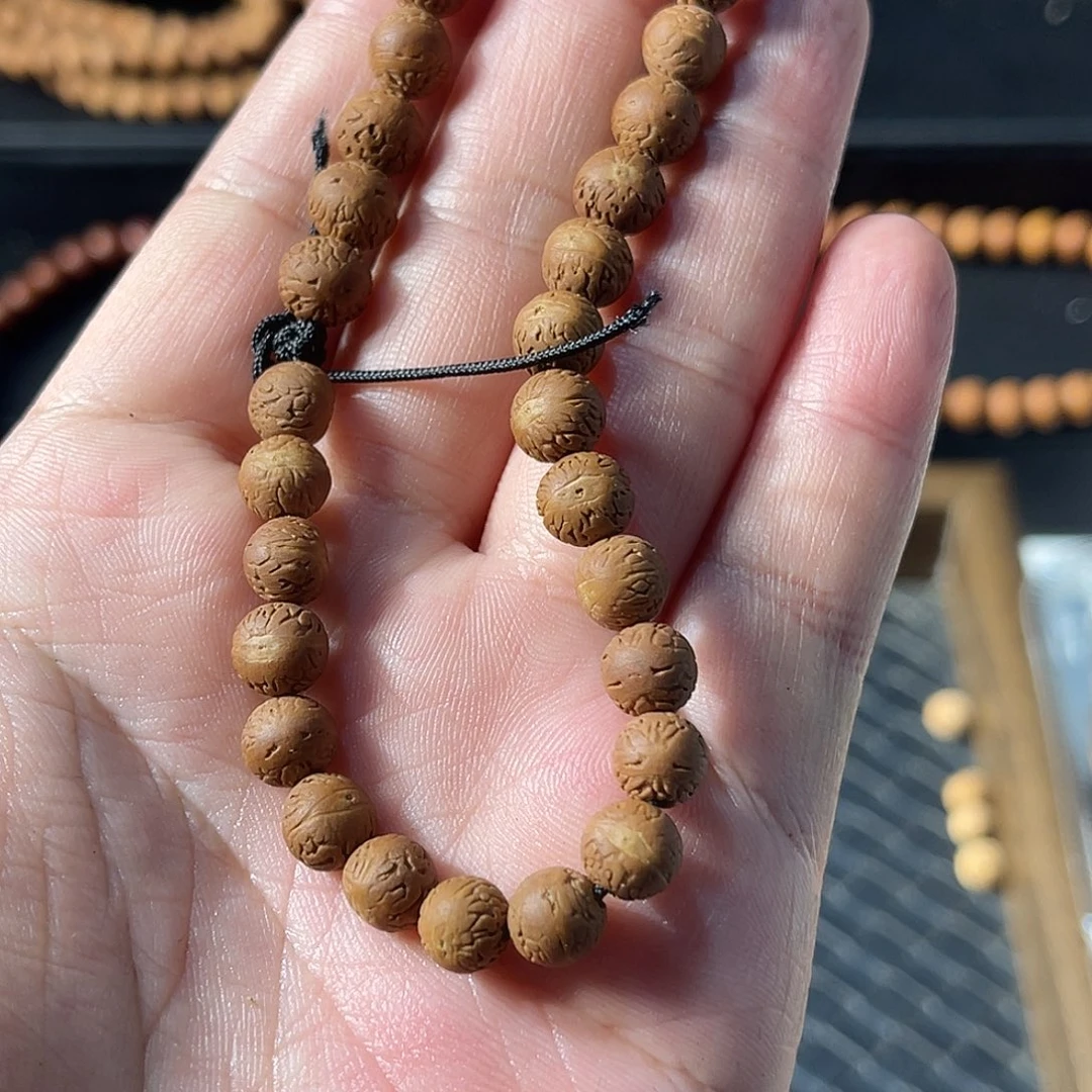 沐***行木质非金属木质非金属酸枣核手串