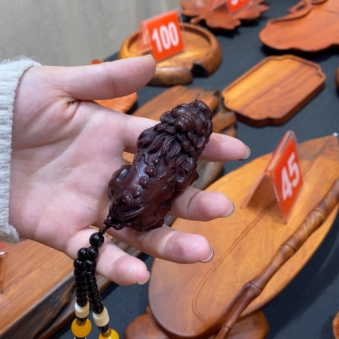 犀角紫檀貔貅把件浮力