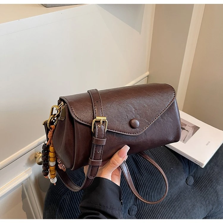 【新款】时尚复古休闲百搭简约潮流单肩斜挎包时尚俐诺袋鼠8564