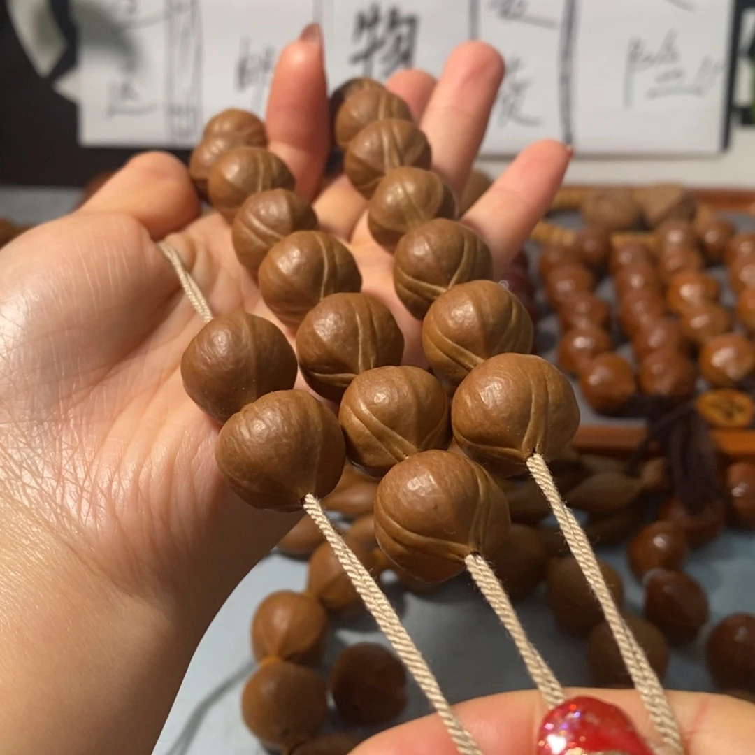 橄榄核手串0271全品蒜头铁核16+2颗+鬼脸