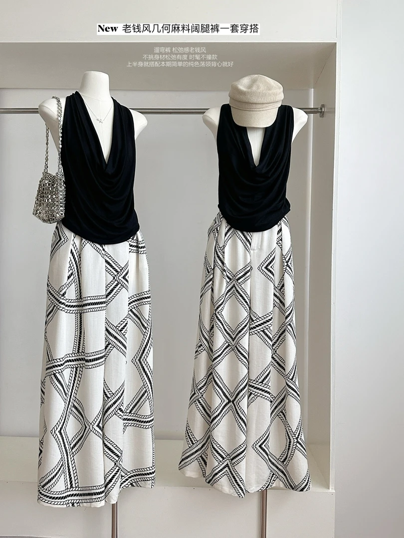 度假风松弛感穿搭杏色印花拖地直筒裤女2025夏季新款显瘦遮肉长裤