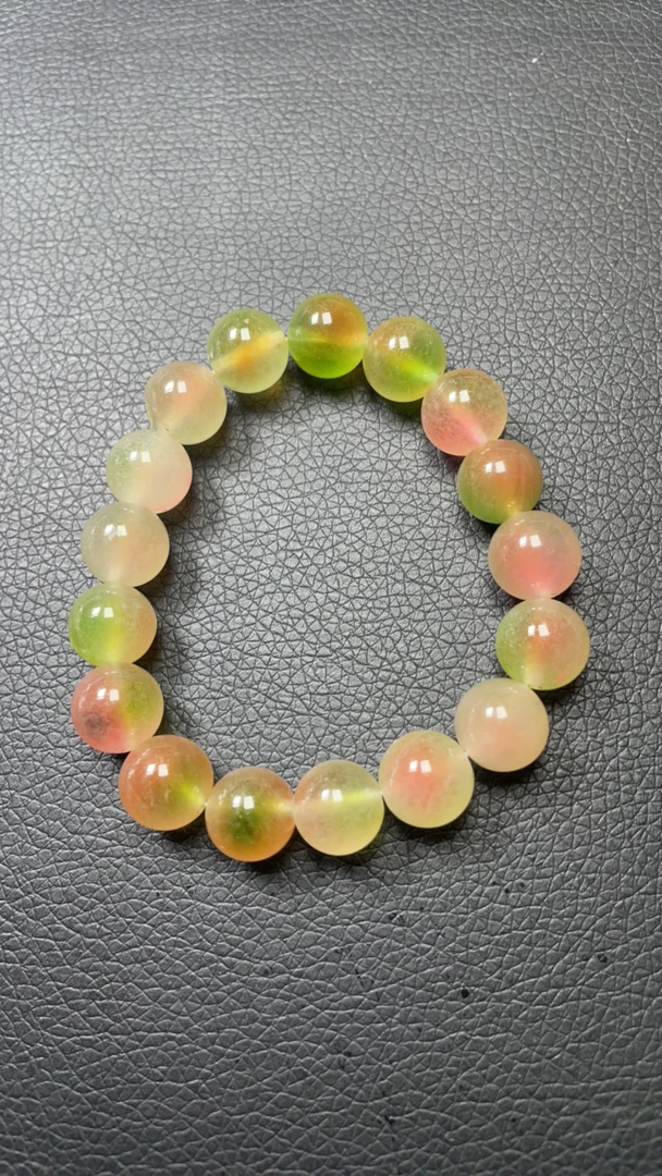 D 15 12 桃红飘绿春彩手串