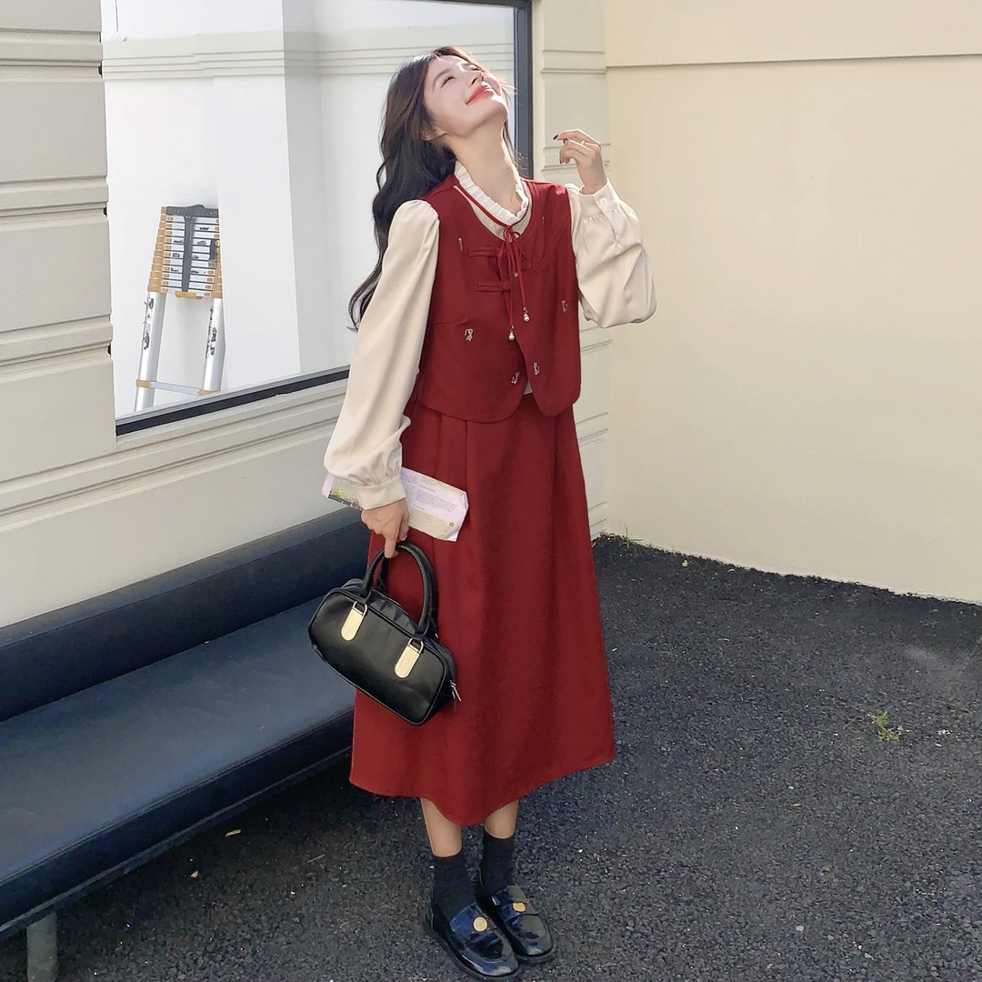 时尚学院风俏皮减龄长裙女2025秋季新款卡通刺绣假两件拼接连衣裙