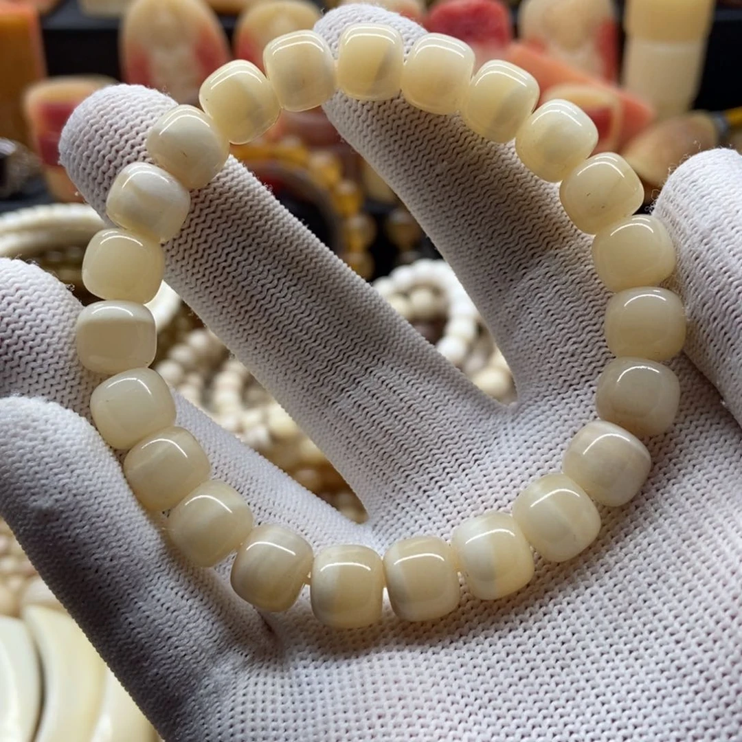 驼骨手串/手链10毫米驼骨三花蜜透