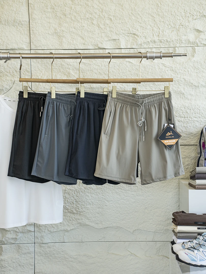 真冰丝！超大弹水柔顺滑空气流格纹透气运动速干纯色沙滩裤短裤