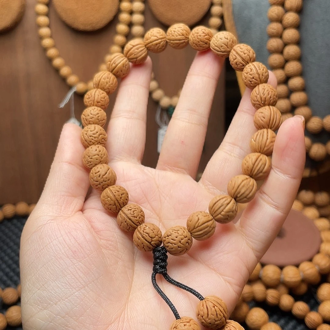 一***民11野生红皮桃核手持