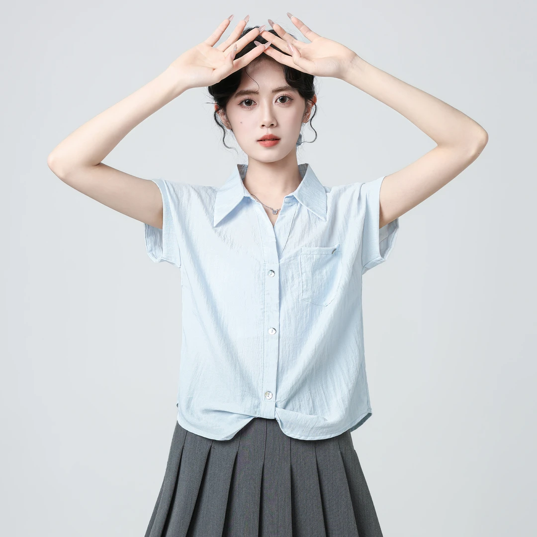 蓝色Polo领短袖衬衫女2025夏季新款韩版宽松设计感不规则衬衣上衣