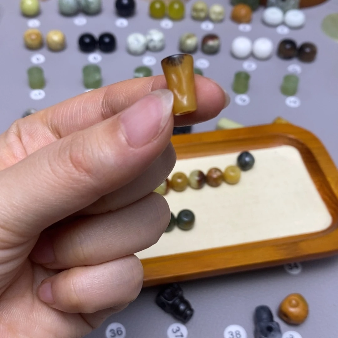 蛇纹石玉配饰合金谭*?