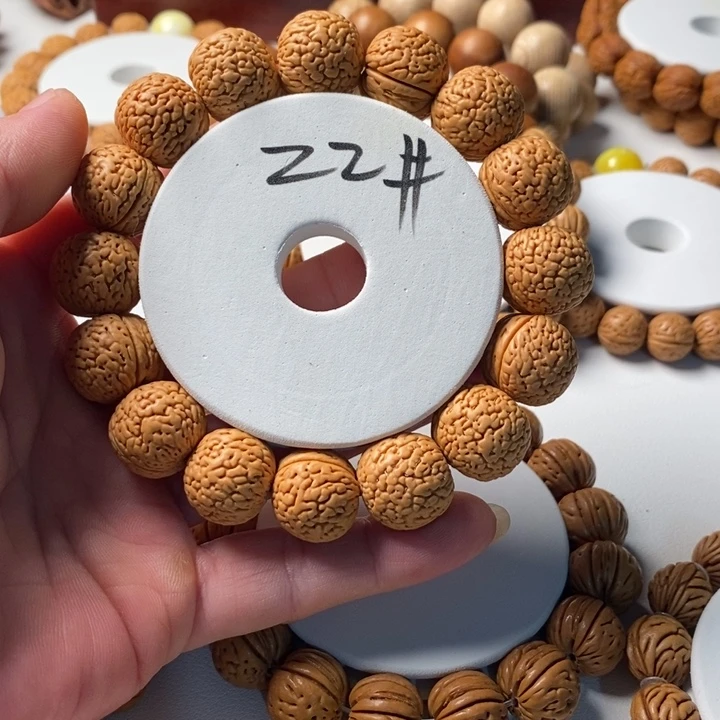 Z***x桃核吊坠精品桃核手串蚂蚁纹