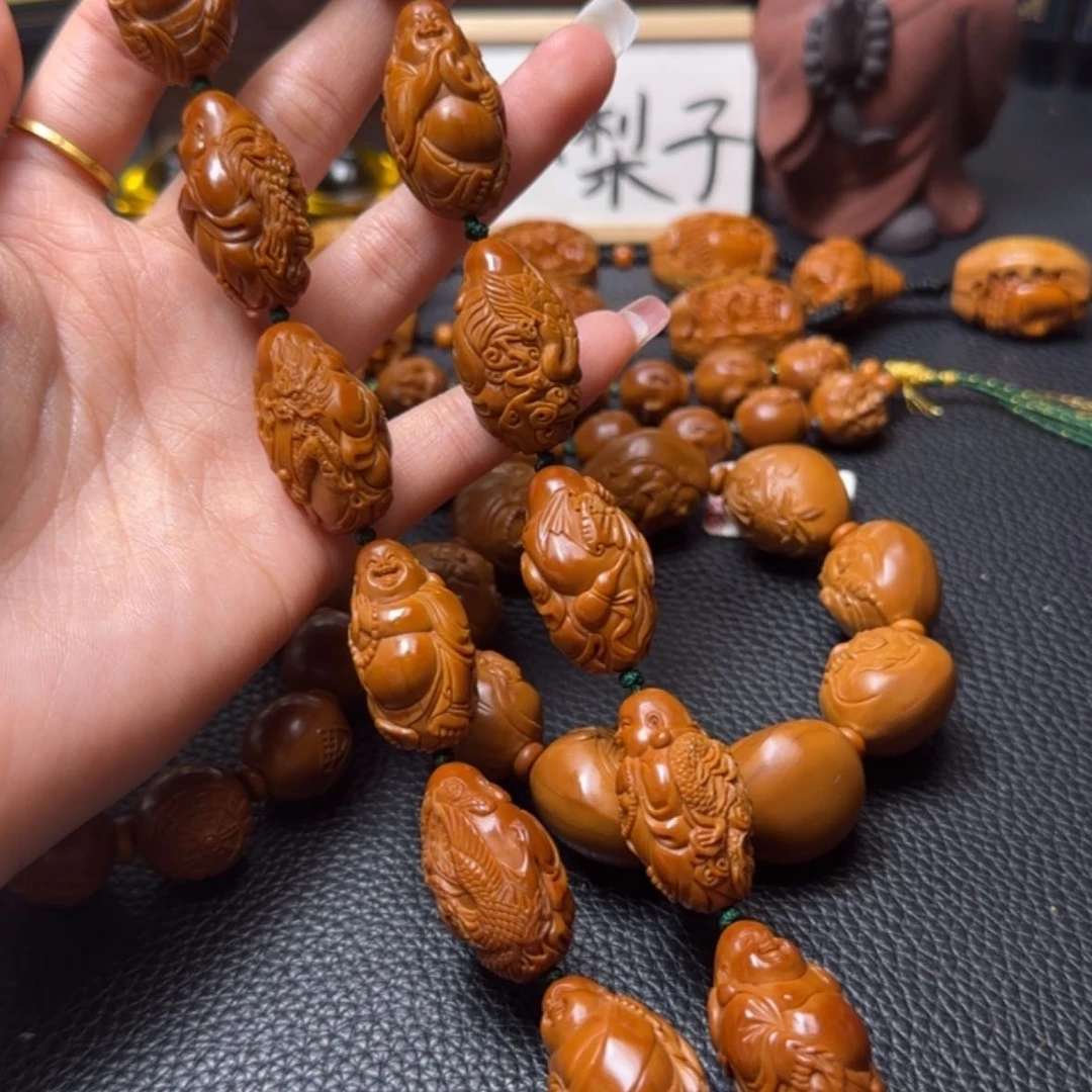 【闪购商品】橄榄核吊坠瑞兽十八弥勒