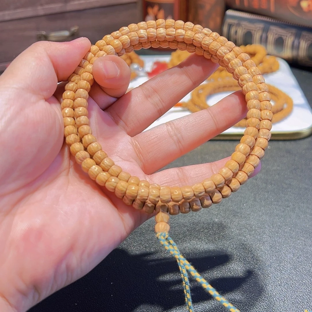 刘***_柏香籽/百香籽吊坠