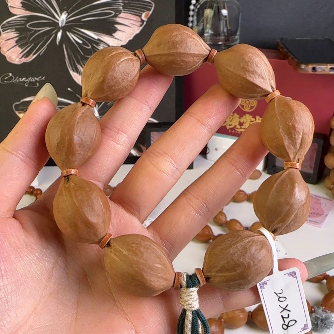 钢***儿橄榄核吊坠梅林铁核2028