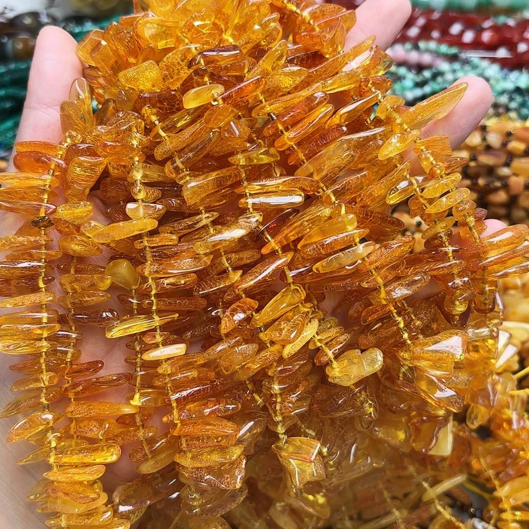 玛瑙/玉髓未镶嵌珠宝半成品琥珀蜜蜡大牙一条